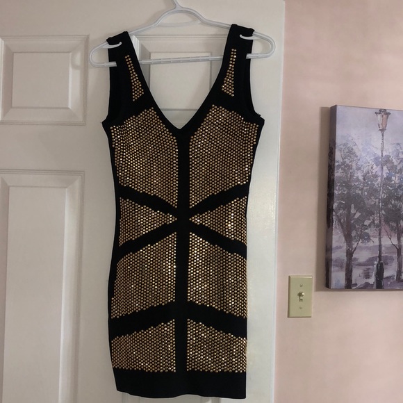 Short dress with golden studs - Picture 2 of 6